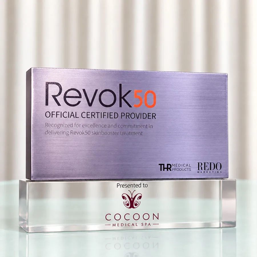 The REVOK50 Official Certified Provider plaque, presented to Cocoon Medical Spa